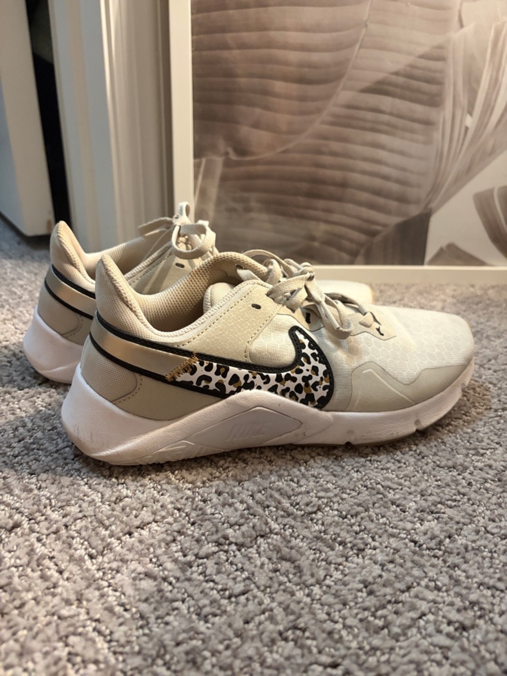Nike Cream Sneakers with Leopard Swoosh Accent